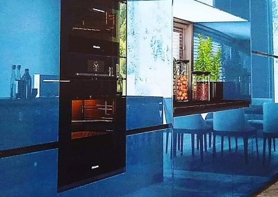 Cocina azul alto brillo.un espejo. Gijón